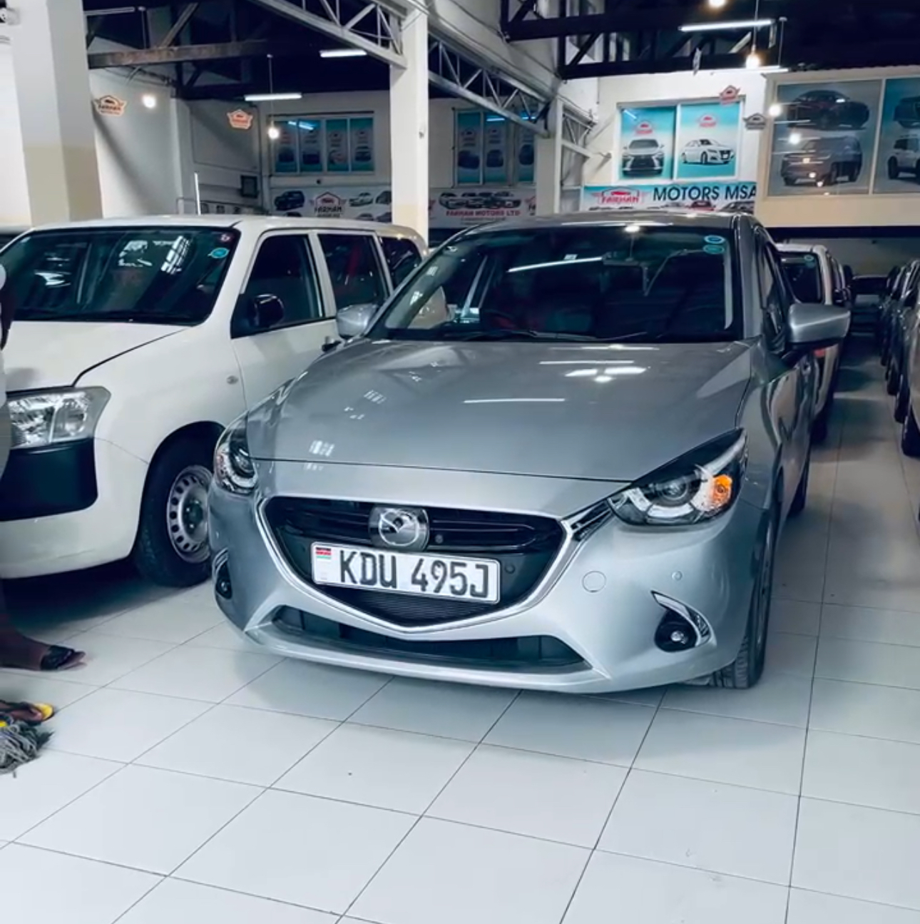 Mazda Demio KDU 495J